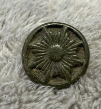 Antiker Knopf mit Sternmotiv